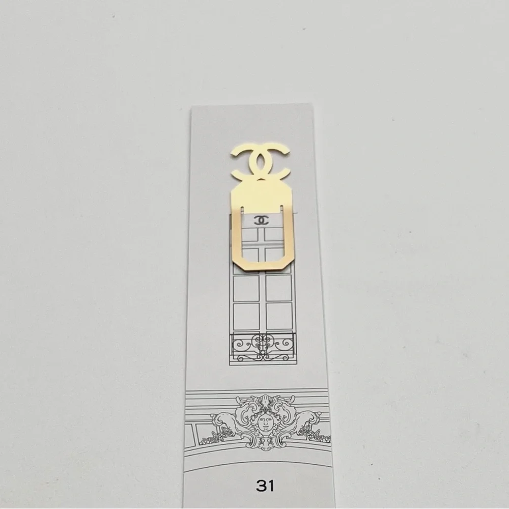 New CHANEL Gold Logo Bookmark
